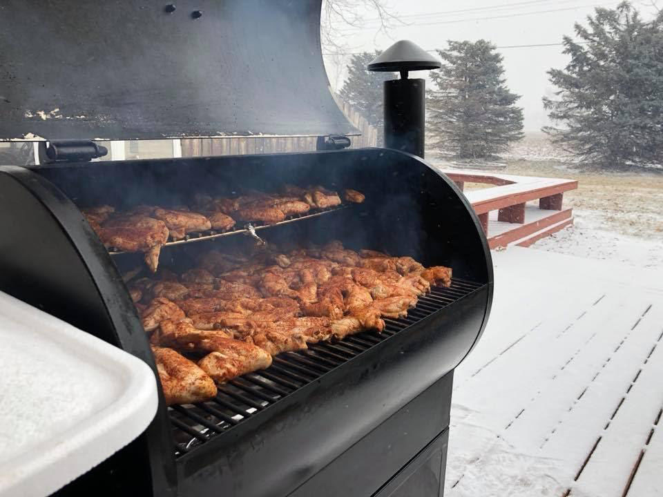 a grill loaded with meat