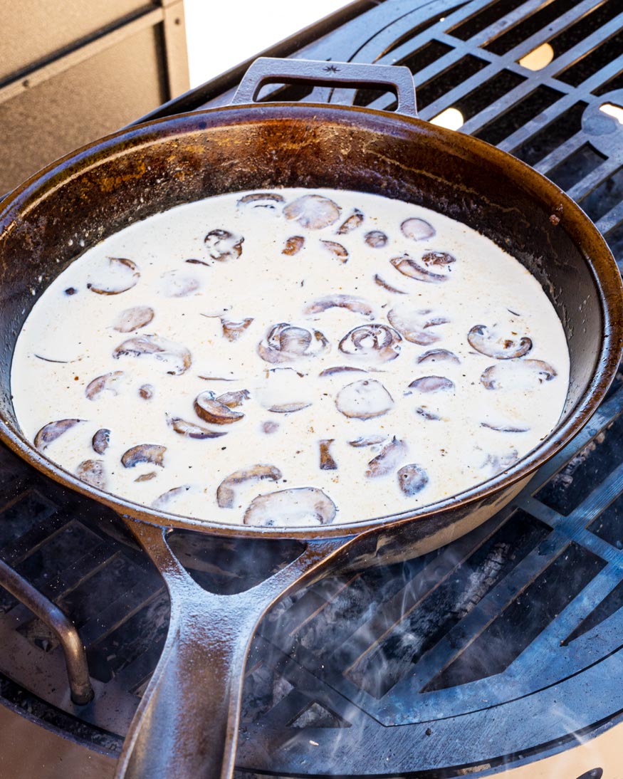 Gorgonzola Mushroom Cream Sauce cooking over the fire