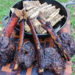 Tomahawk Beef Short Ribs with bone marrow plated.