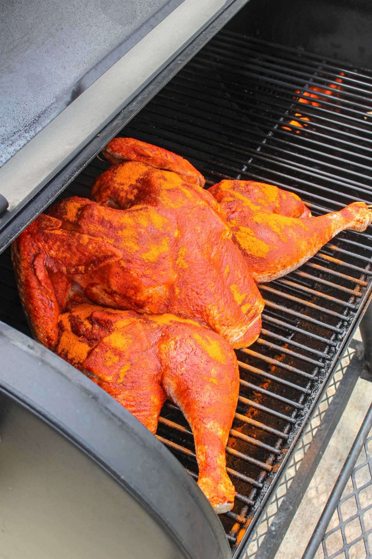 Maple Bourbon Spatchcock Turkey seasoning and on the smoker. 