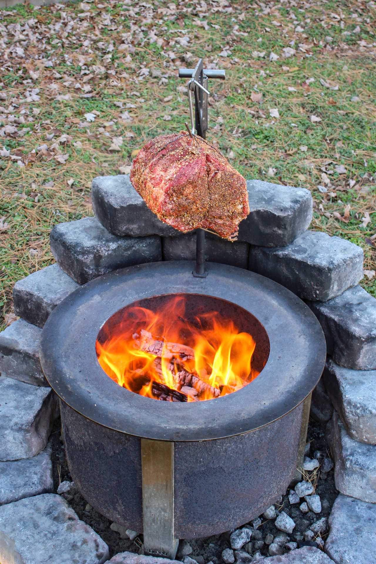 Hanging Prime Rib getting set up over the flames. 