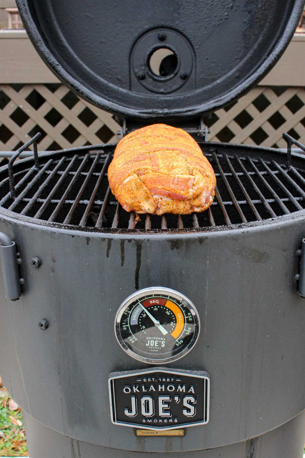 Chorizo Breakfast Fatty getting placed on the smoker.