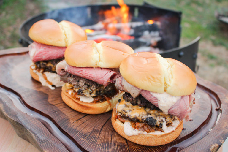 Three Steakhouse Smash Burger lined up and ready to serve.