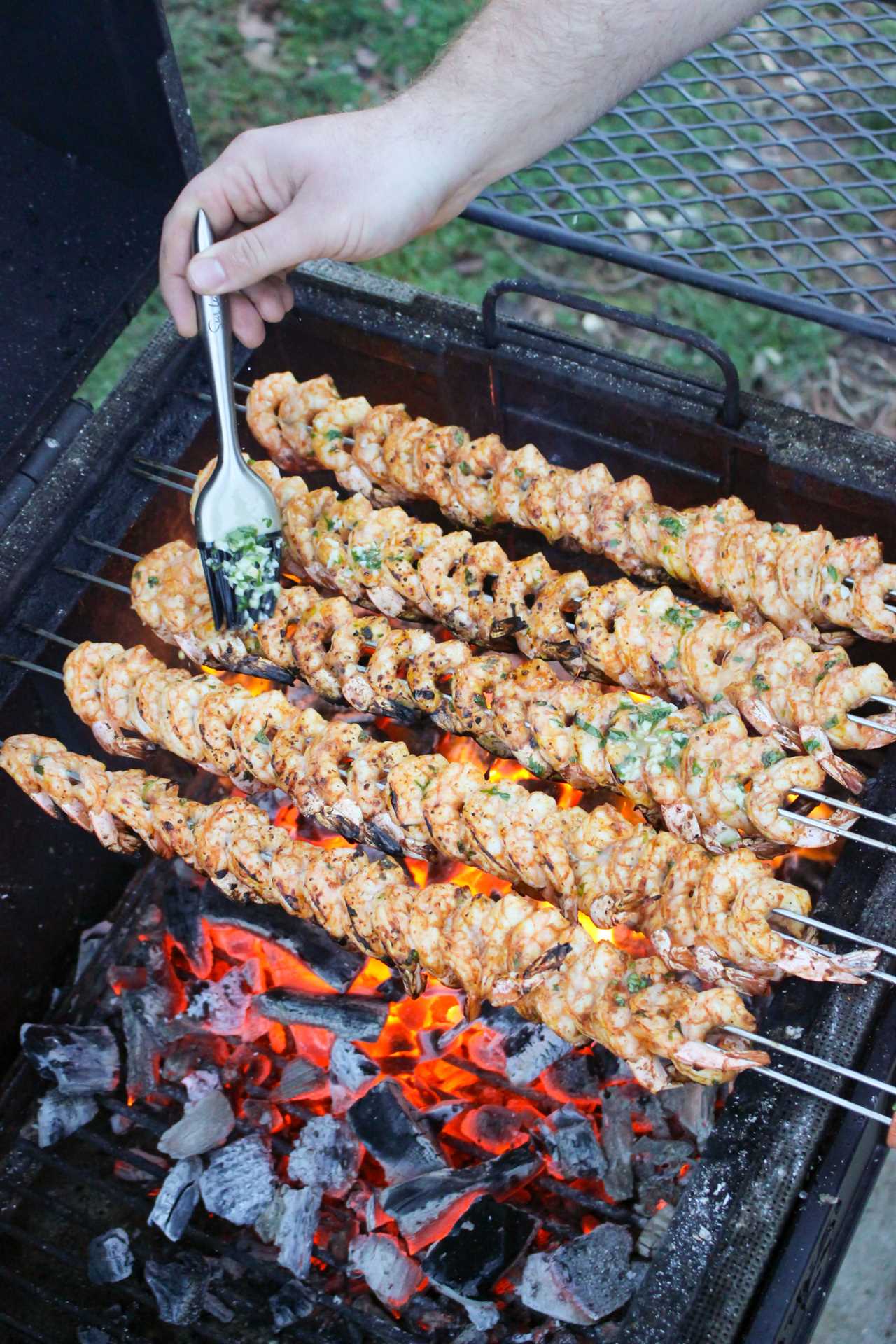 Spicy Tequila Lime Shrimp Skewers getting the butter baste.