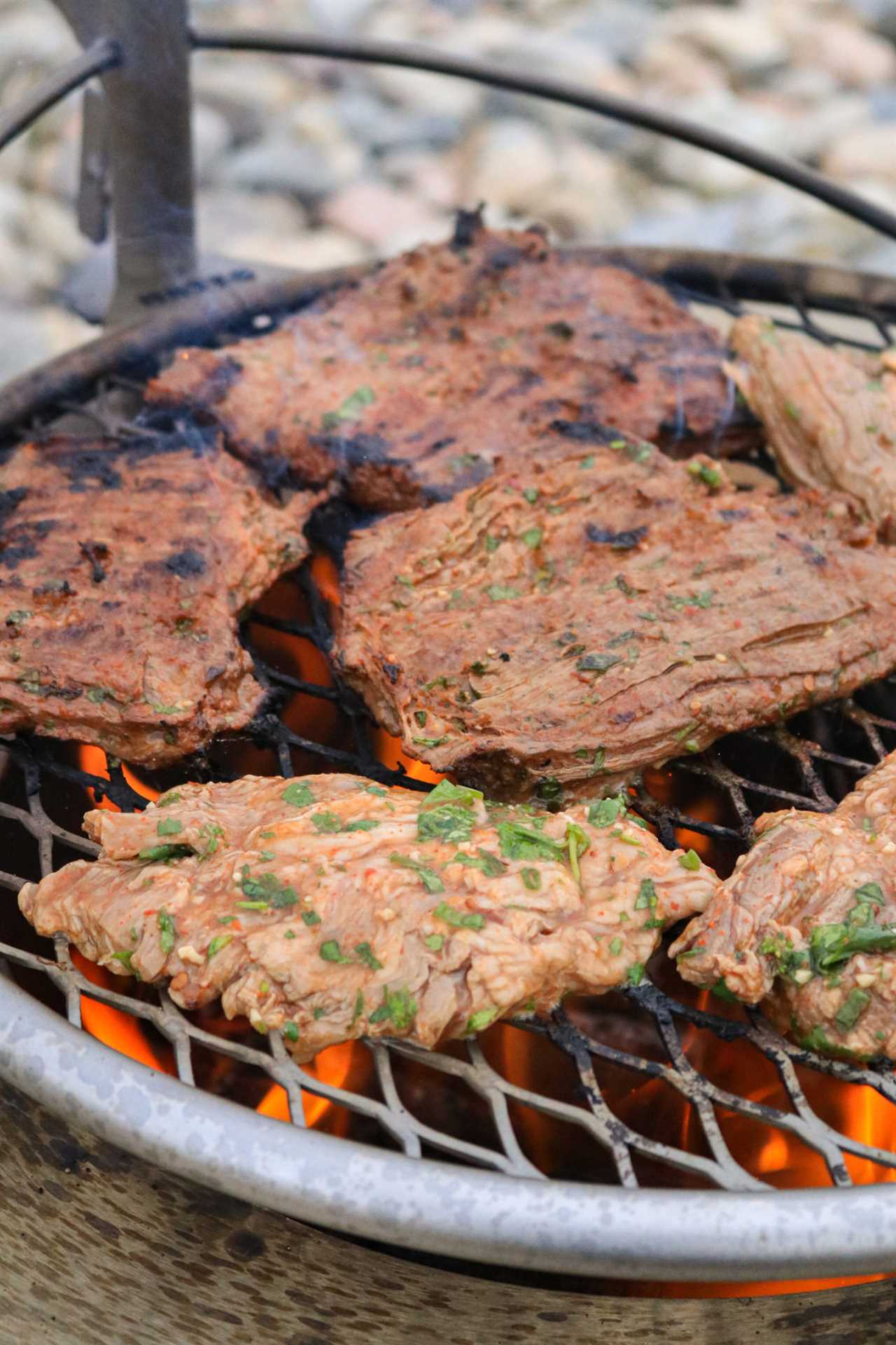 Chipotle Beer Steak flipped and starting to char.