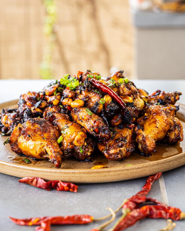 Grilled Kung Pao Chicken Wings plated and ready to serve.