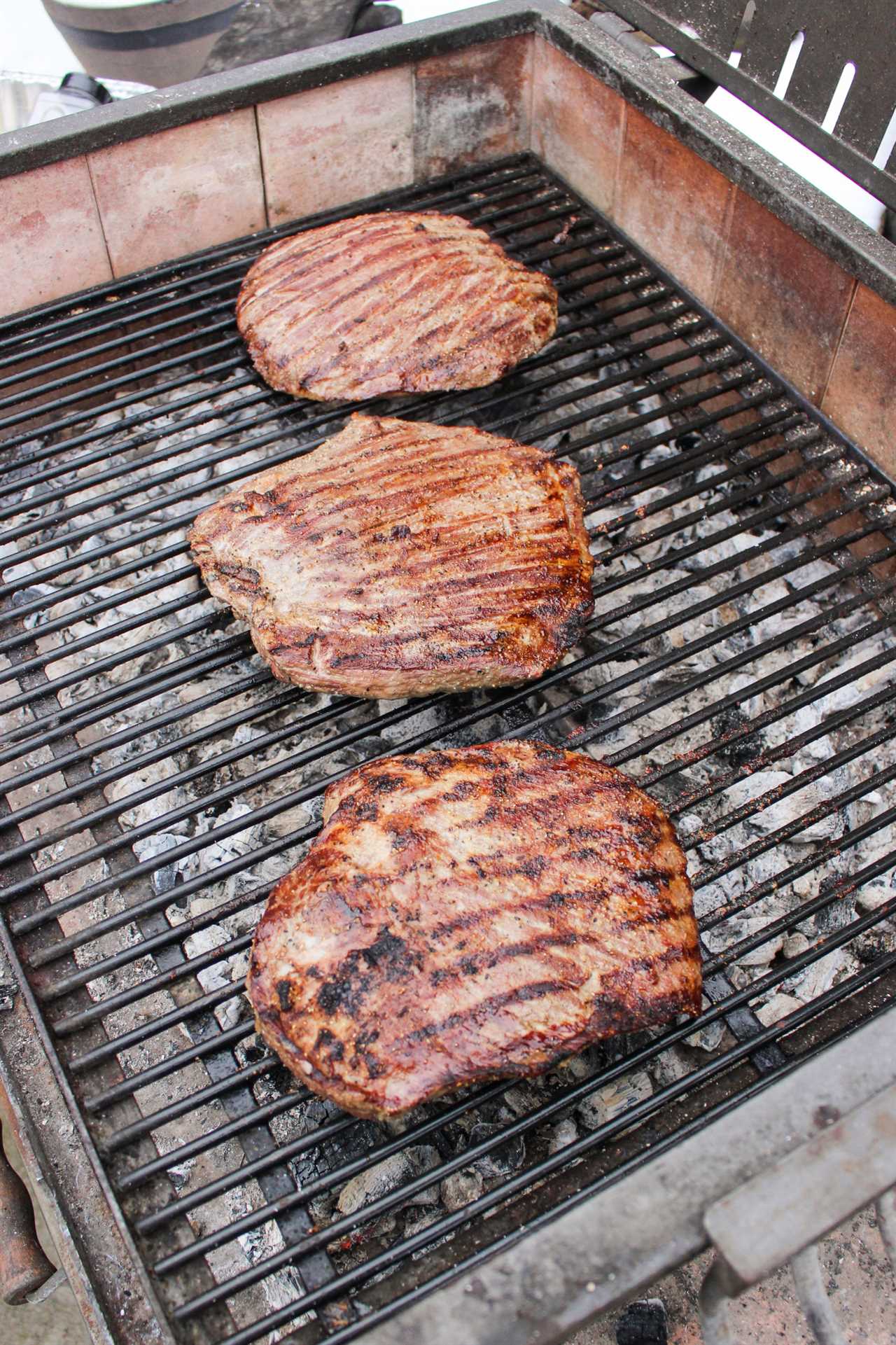 Matambre A La Pizza steaks with grill marks.