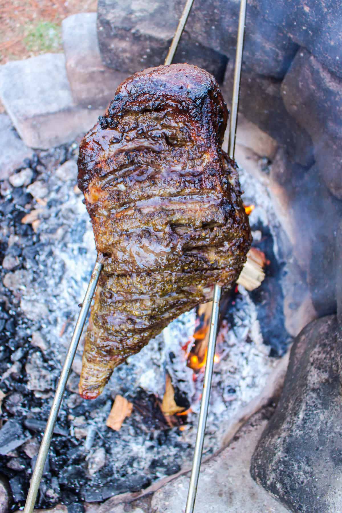 Rotisserie Leg of Lamb ready to be pulled from the fire and served.