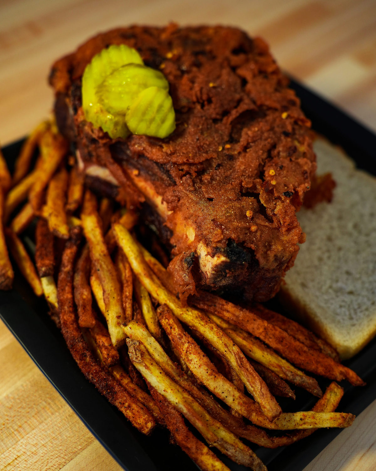 Nashville Hot Steak Frites plated and served.