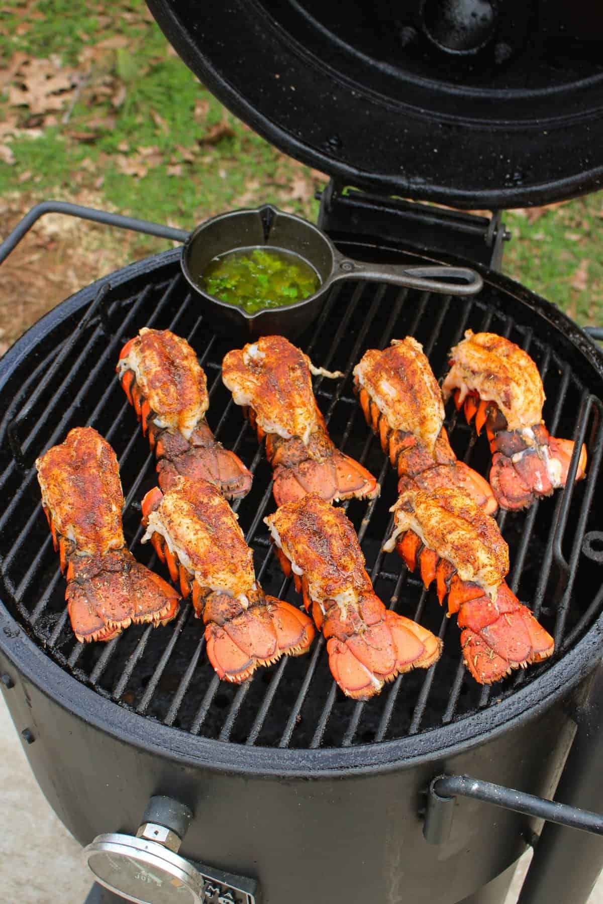 Honey Cajun Smoked Lobster Tails sitting on the smoker.