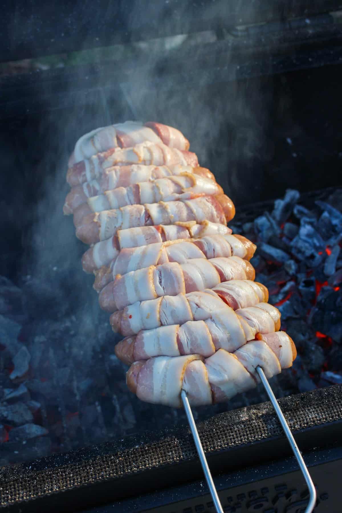 Chicken Bacon Ranch Sausage Skewers getting started on the grill. 