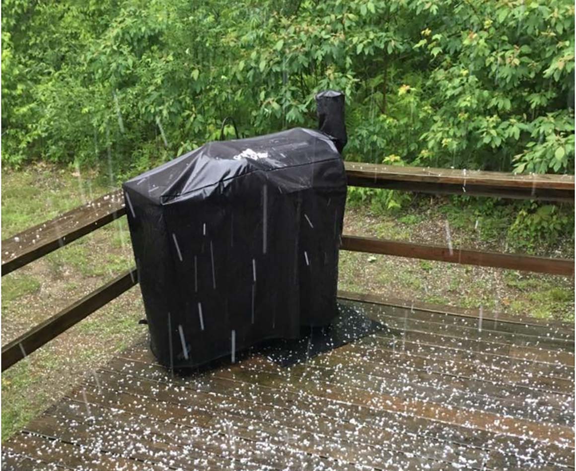 grill on patio with cover from snow