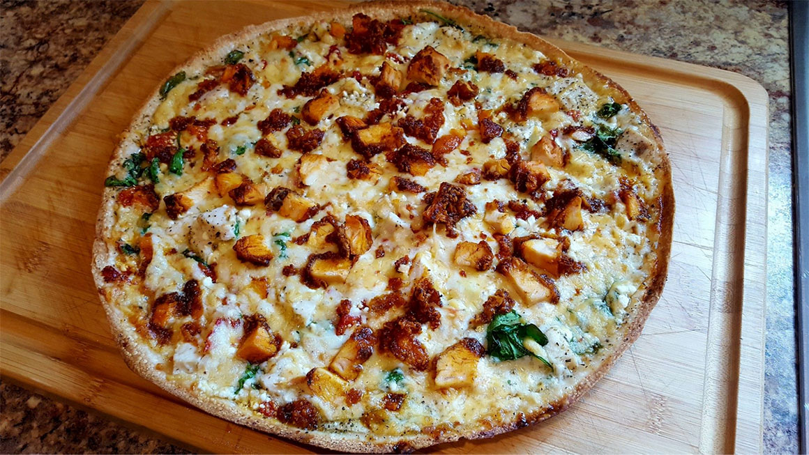 homemade pizza on serving tray