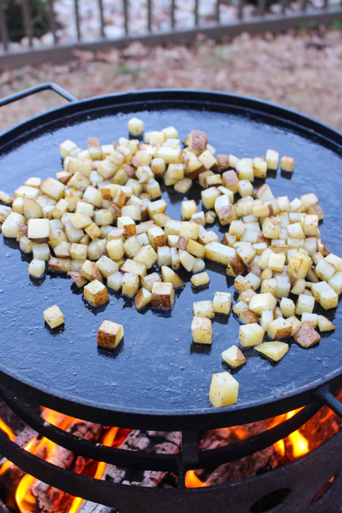 Breakfast Fry Up getting started by roasting the potatoes.