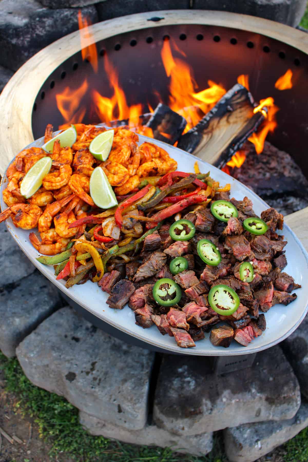 Surf and Turf Fajitas plated and ready to be assembled into tacos.