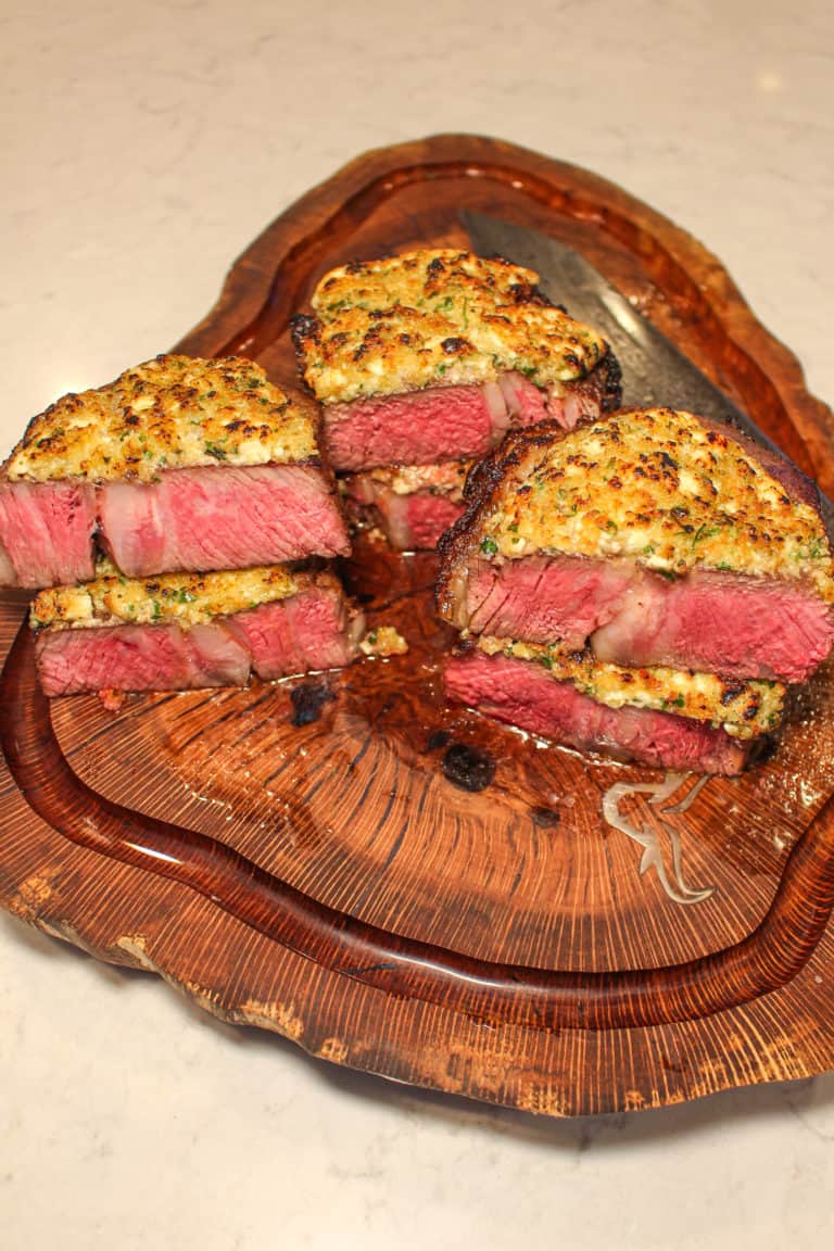 Blue Cheese Crusted Steaks sliced and ready to serve.