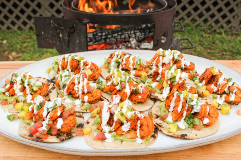 Shrimp "Al Pastor" garnished and plated ready to eat.