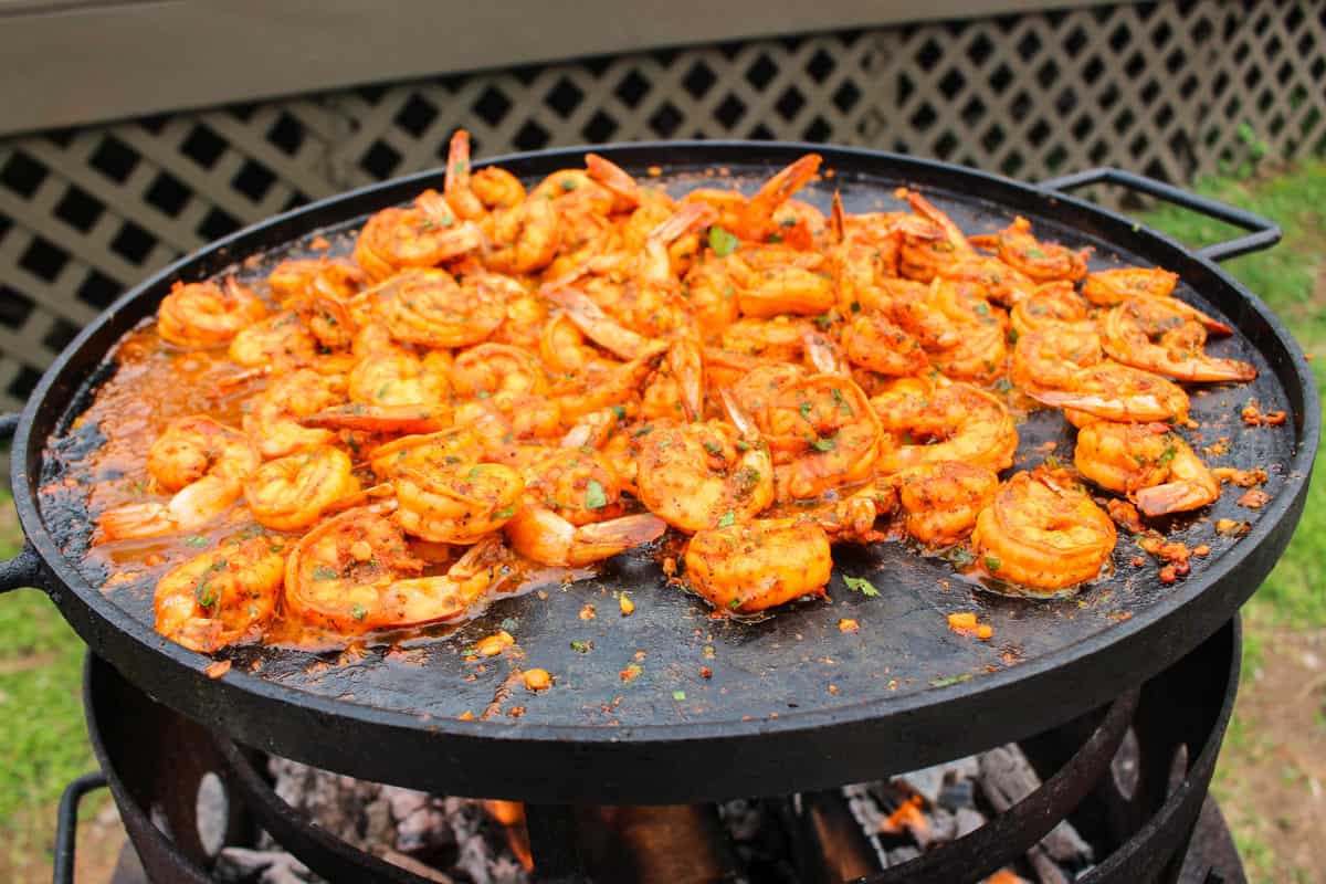 Shrimp cooking over the fire.