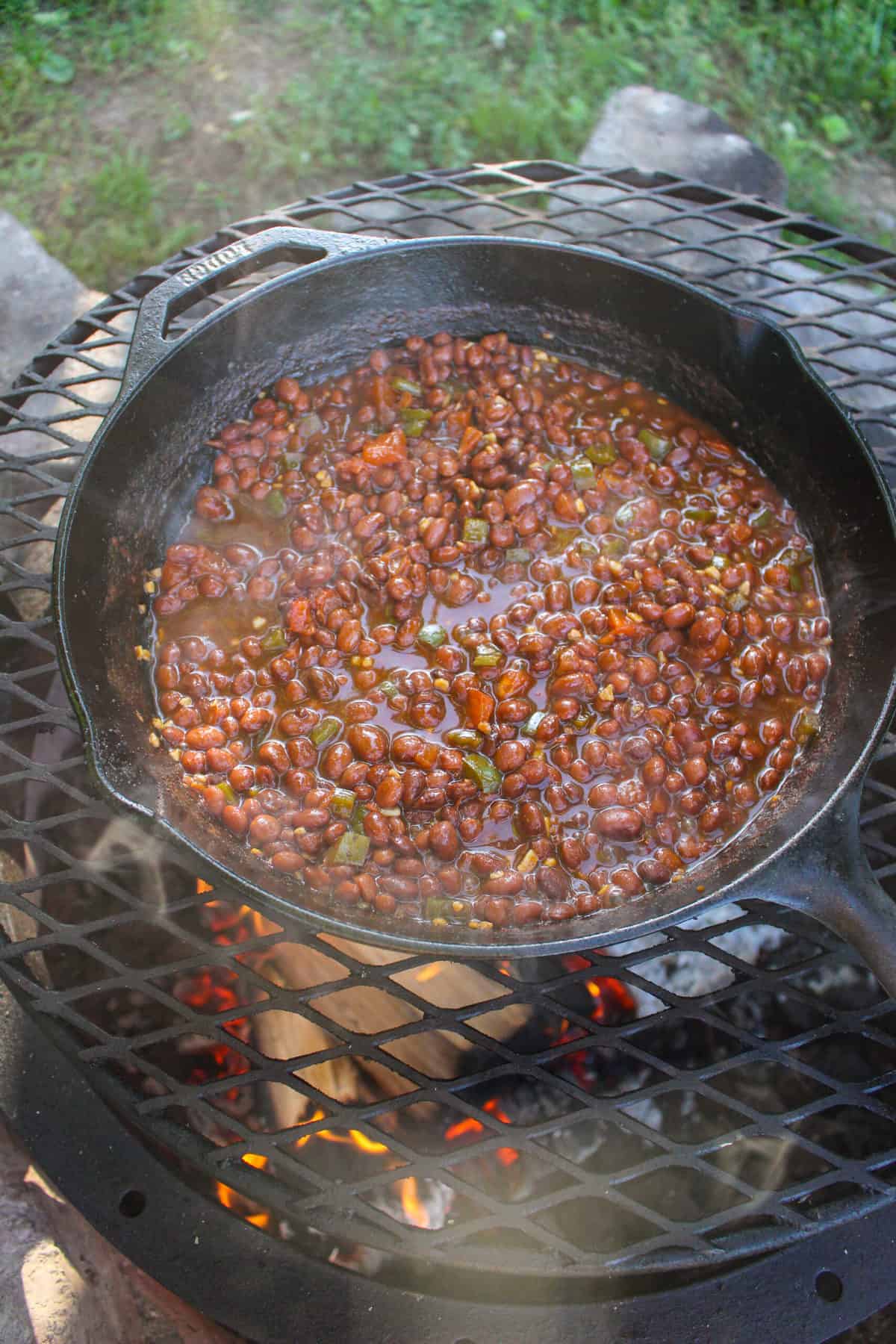 overhead of a skillet filled with spicy pinquito beans