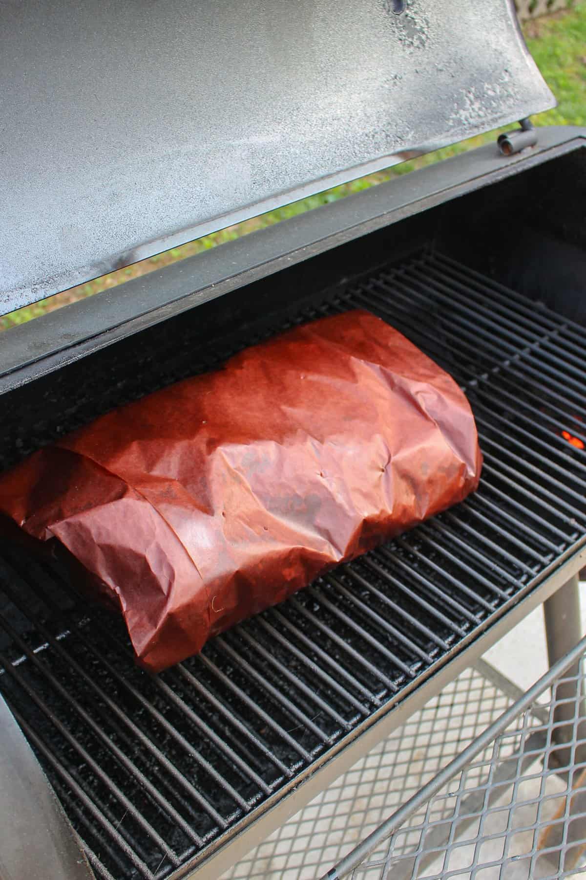 The wrapped Texas Smoked Brisket on the smoker.