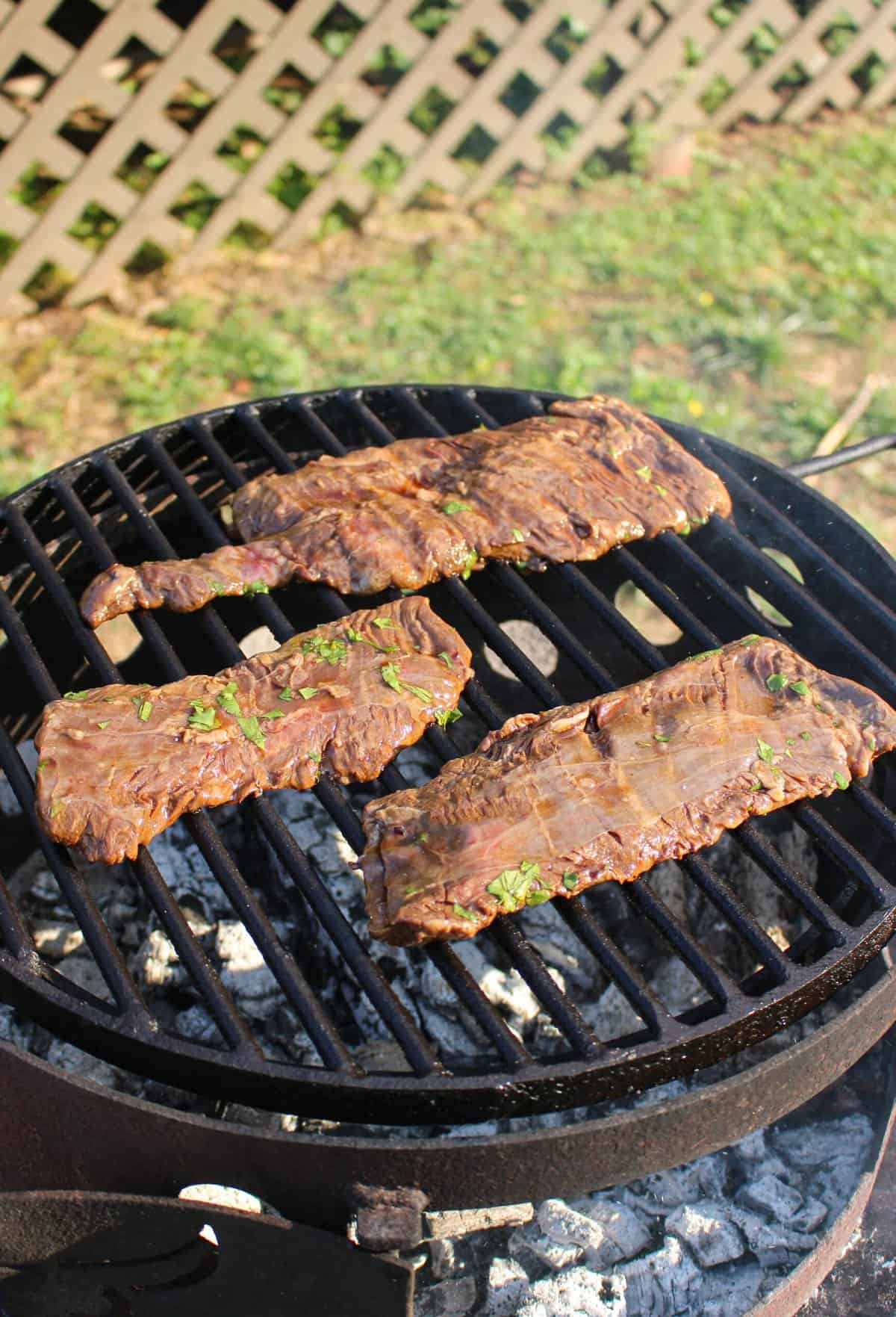 uncooked steak on the grill