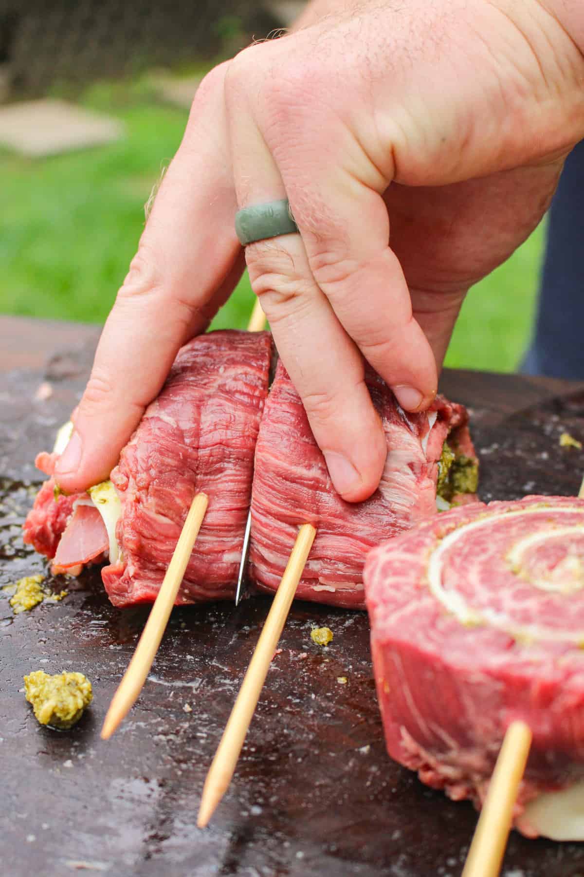 rolled up pinwheels being sliced in half