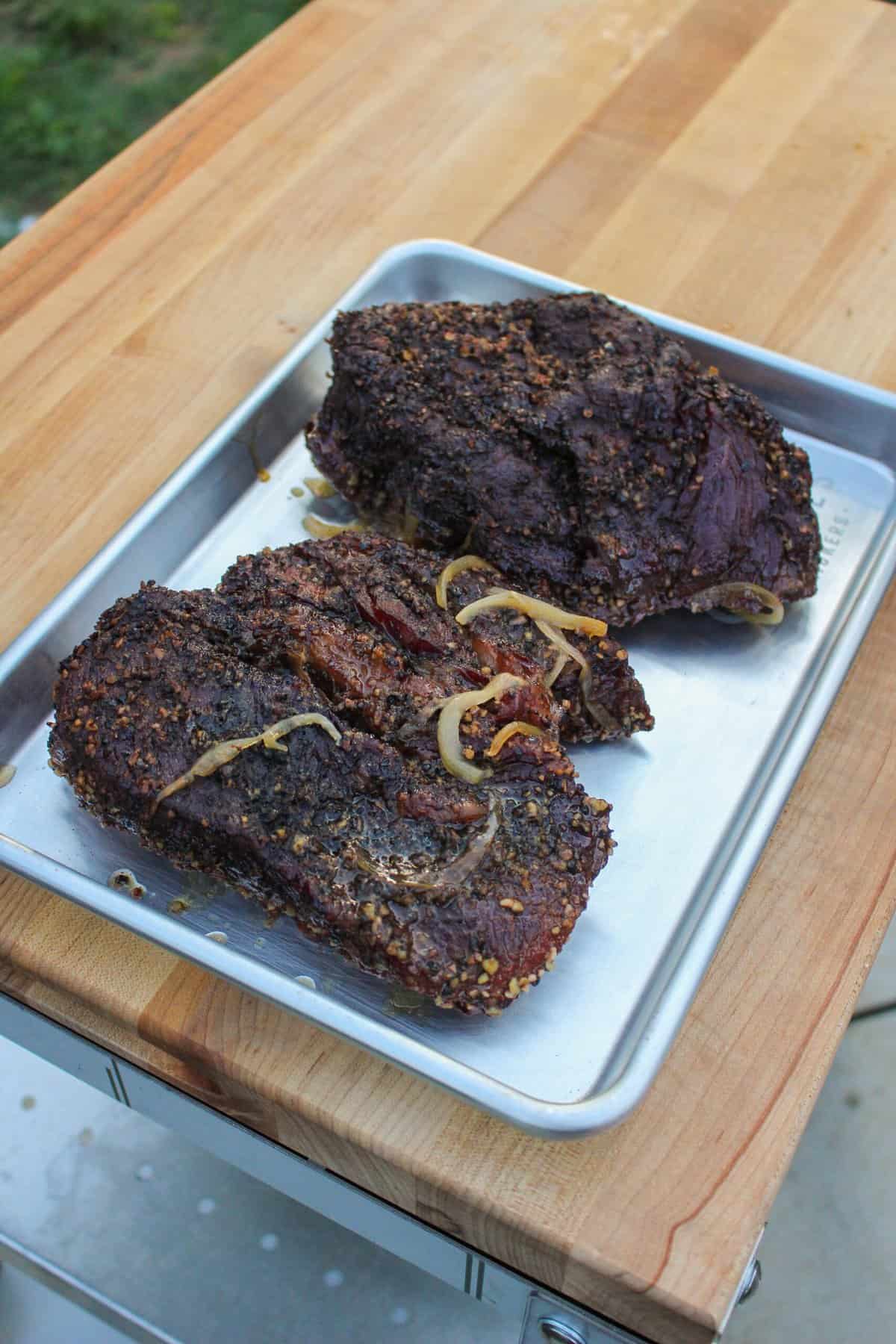 cooked beef on a baking sheet from above