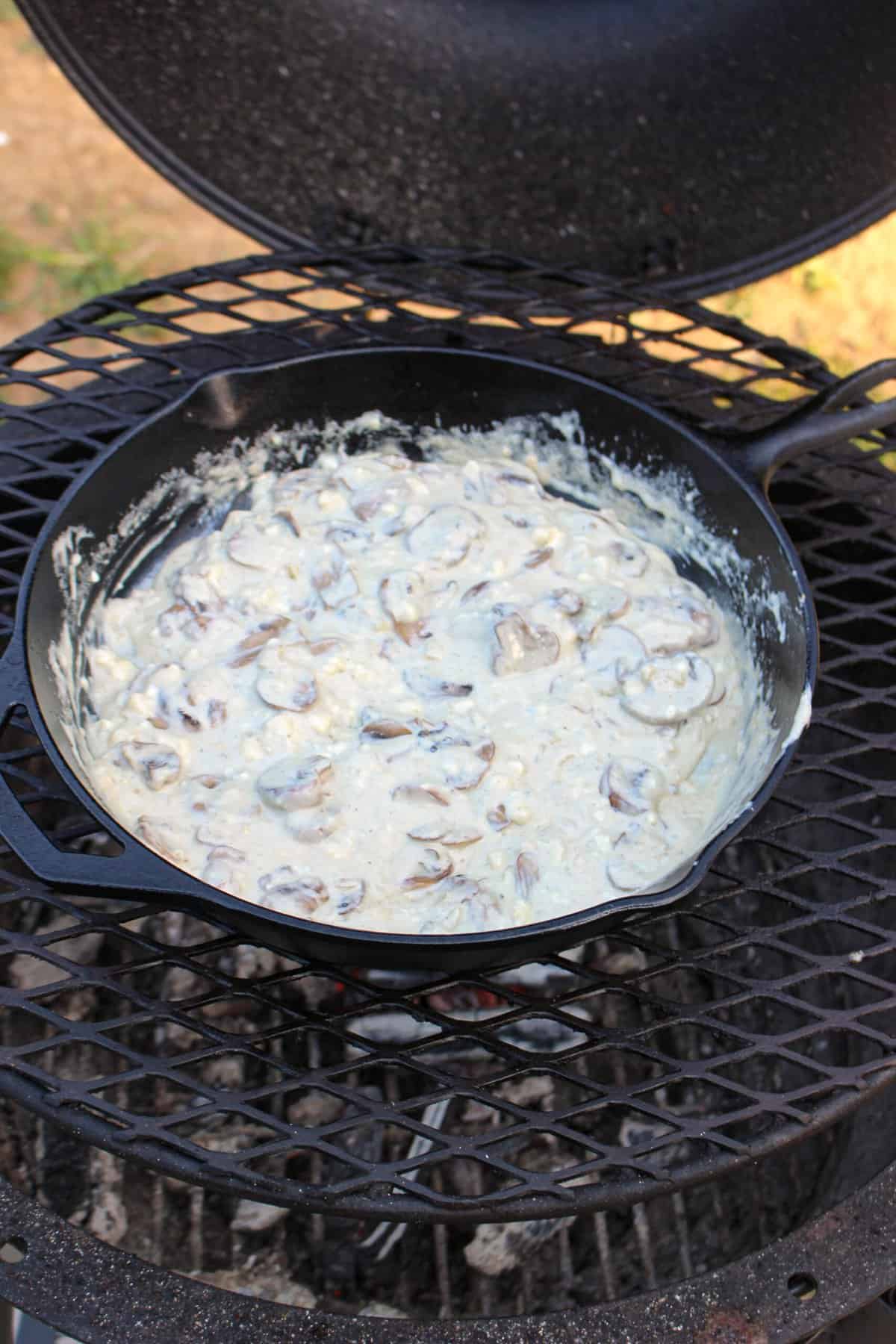 finished blue cheese and mushroom cream sauce in a skillet