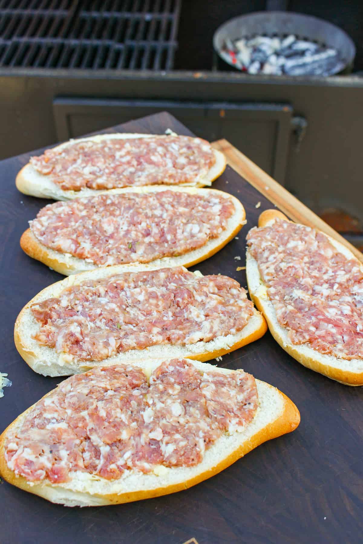 closeup of buns layered with ground sausage