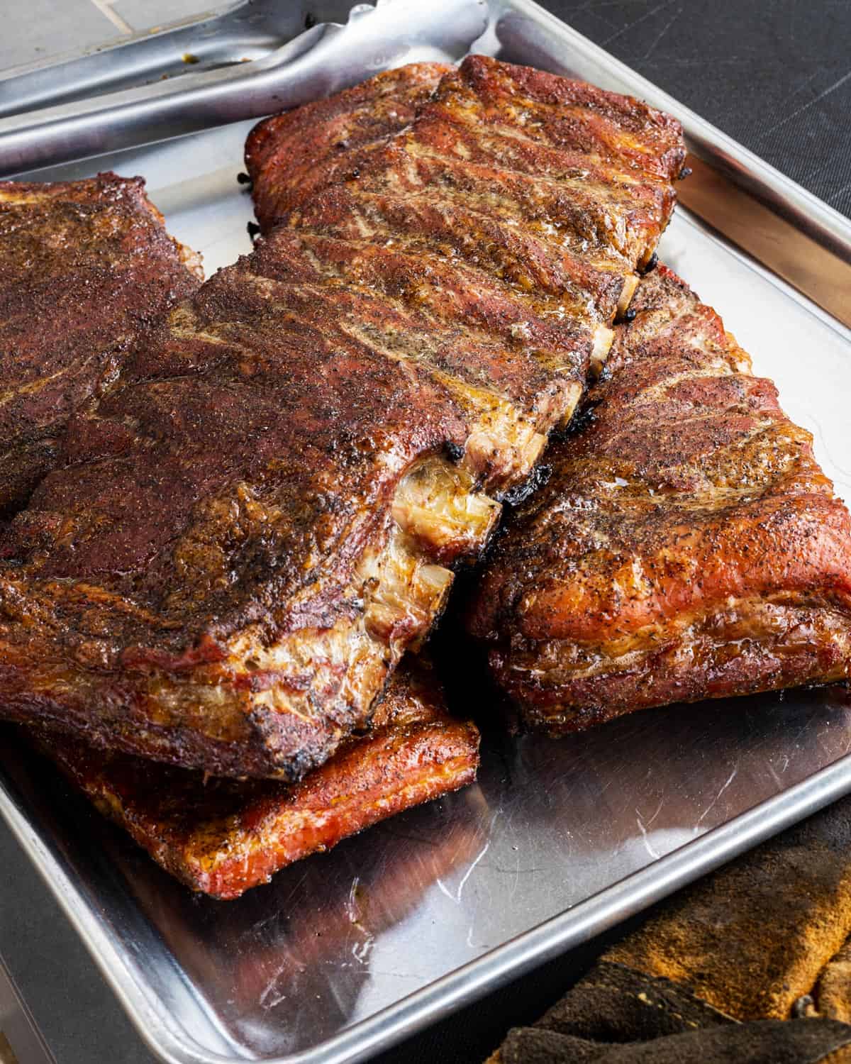 Smoked ribs ready to be glazed.