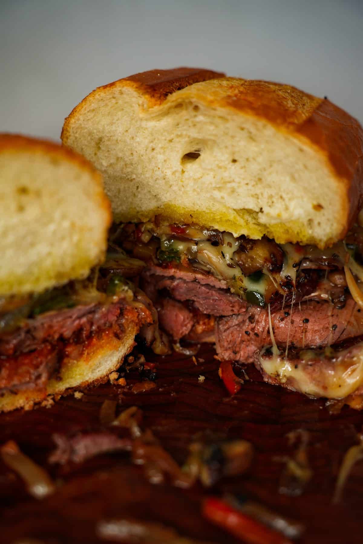 A sliced shot of the pizza cheesesteak.