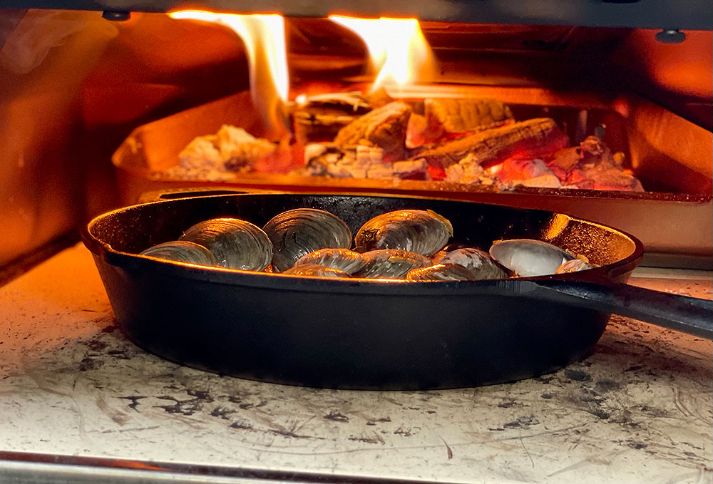 Clams cooking in the Ooni