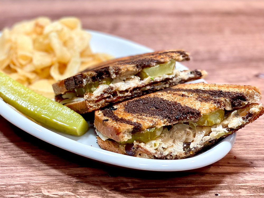 Planet Barbecue Pastrami Bacon Reuben