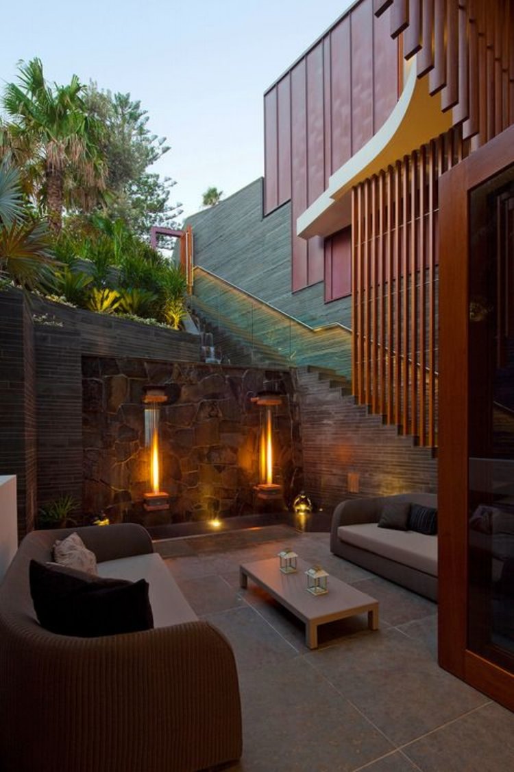 Serene Enclosed Area with Water Feature & Lights